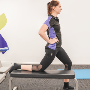 Hip flexor / Quad Stretch - Standing hip flexor using bench​